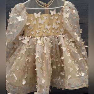 Butterfly Baby doll dress from Rue Muu.